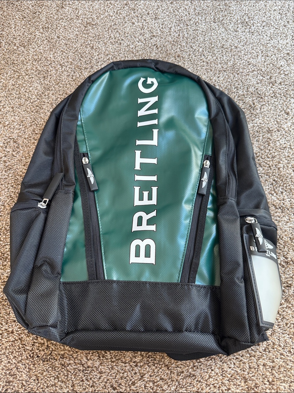 Breitling Green and Black Backpack with Bold Logo